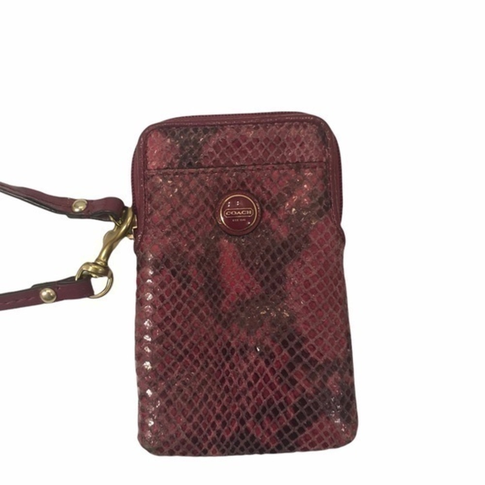 Coach pink python embossed wristlet bag
